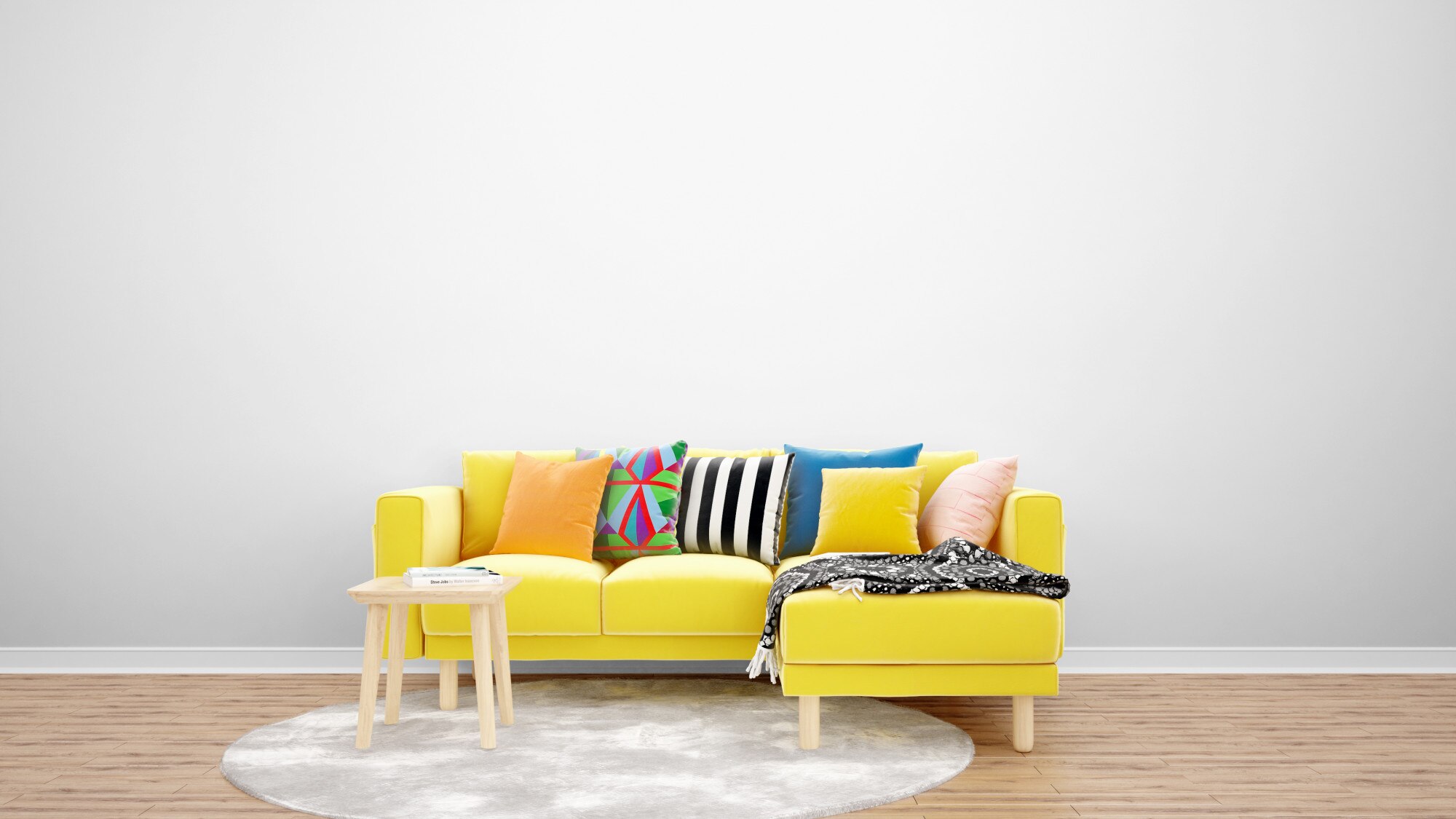 Gelbe Couch mit Kissen, Decke und Stuhl